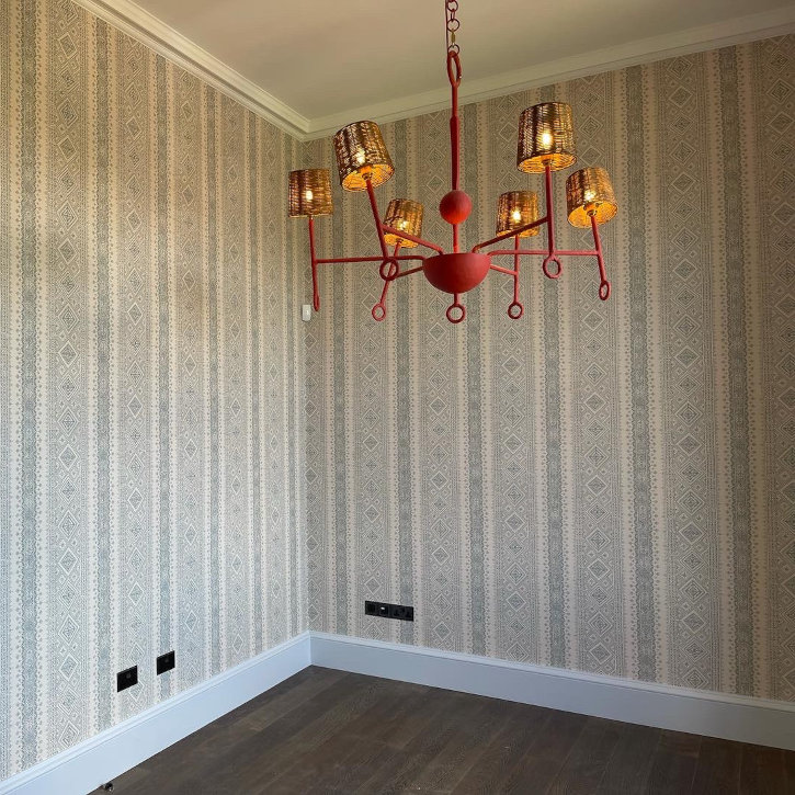 Patterned wallpaper hung in an Edinburgh dining room